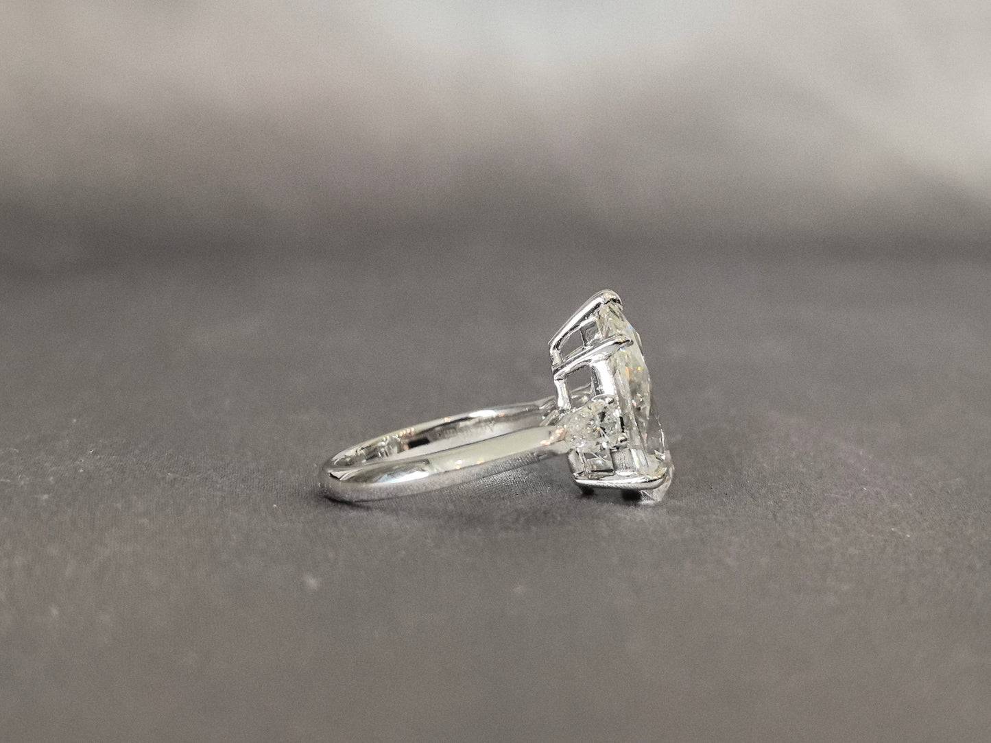 Pear-Center Trilogy Ring | Pear Sidestones | Fluid Harmony | Lab-Grown Diamonds