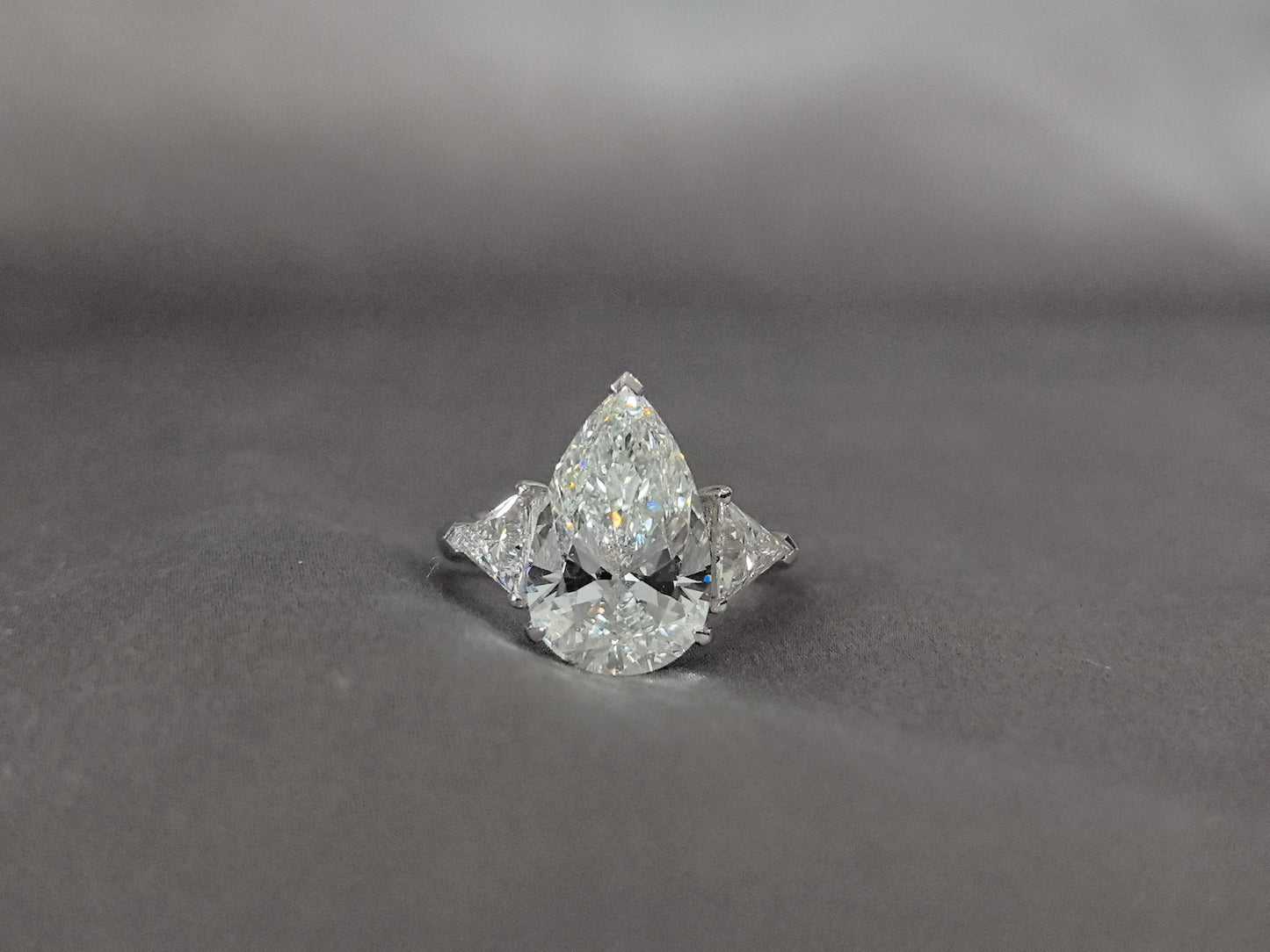 Pear-Center Trilogy Ring | Trillion-Cut Sidestones | Fluid Geometry | Lab-Grown Diamonds