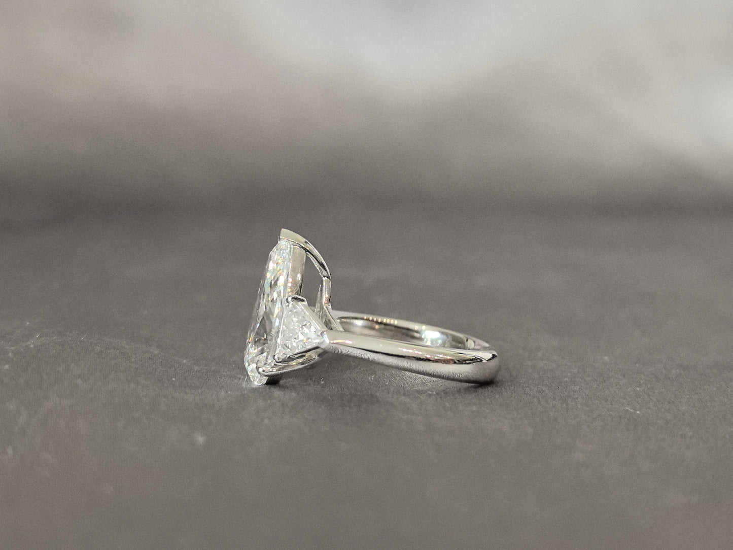 Pear-Center Trilogy Ring | Trillion-Cut Sidestones | Fluid Geometry | Lab-Grown Diamonds