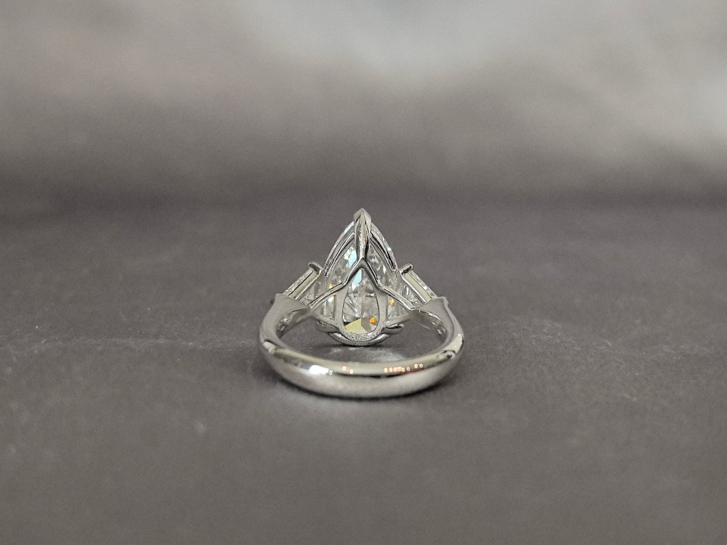 Pear-Center Trilogy Ring | Trillion-Cut Sidestones | Fluid Geometry | Lab-Grown Diamonds