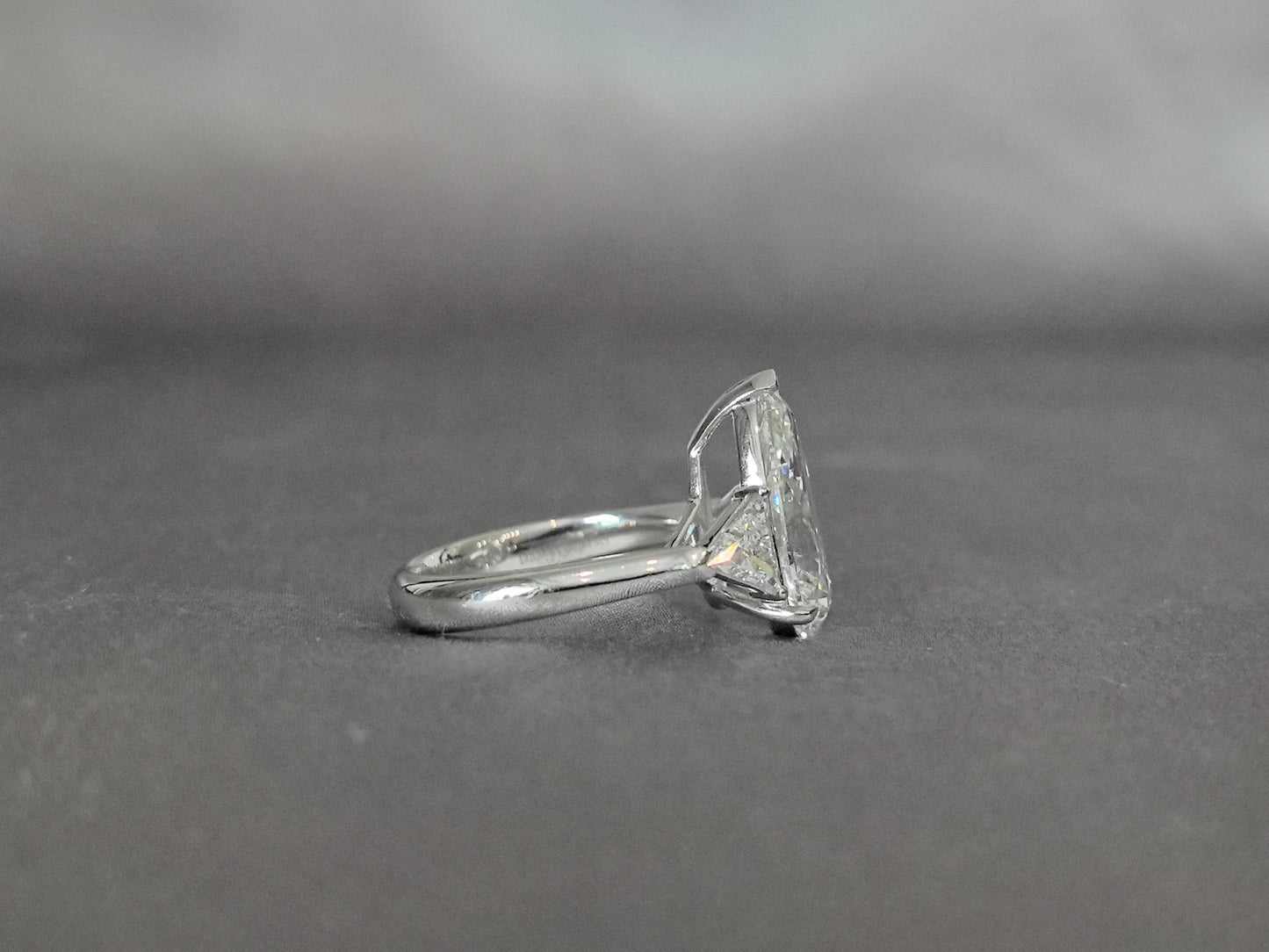 Pear-Center Trilogy Ring | Trillion-Cut Sidestones | Fluid Geometry | Lab-Grown Diamonds