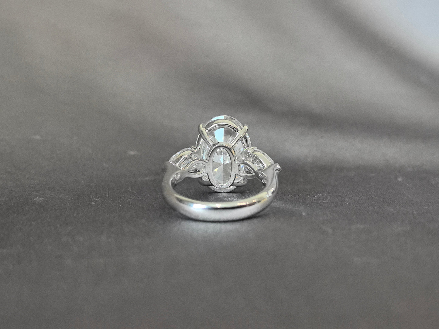 Oval-Center Trilogy Ring with Pear Sidestones