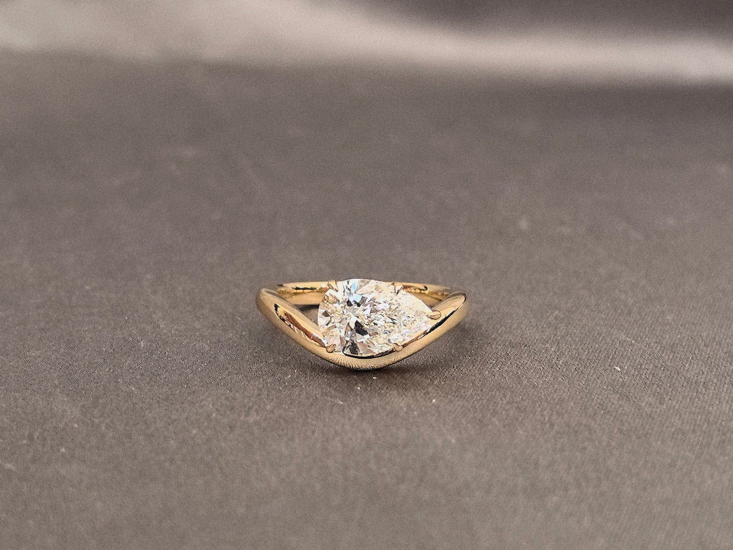 East-West Pear Cut Lab Diamond Pinky Ring | Twisted Band | 14K Gold | Artistic Statement