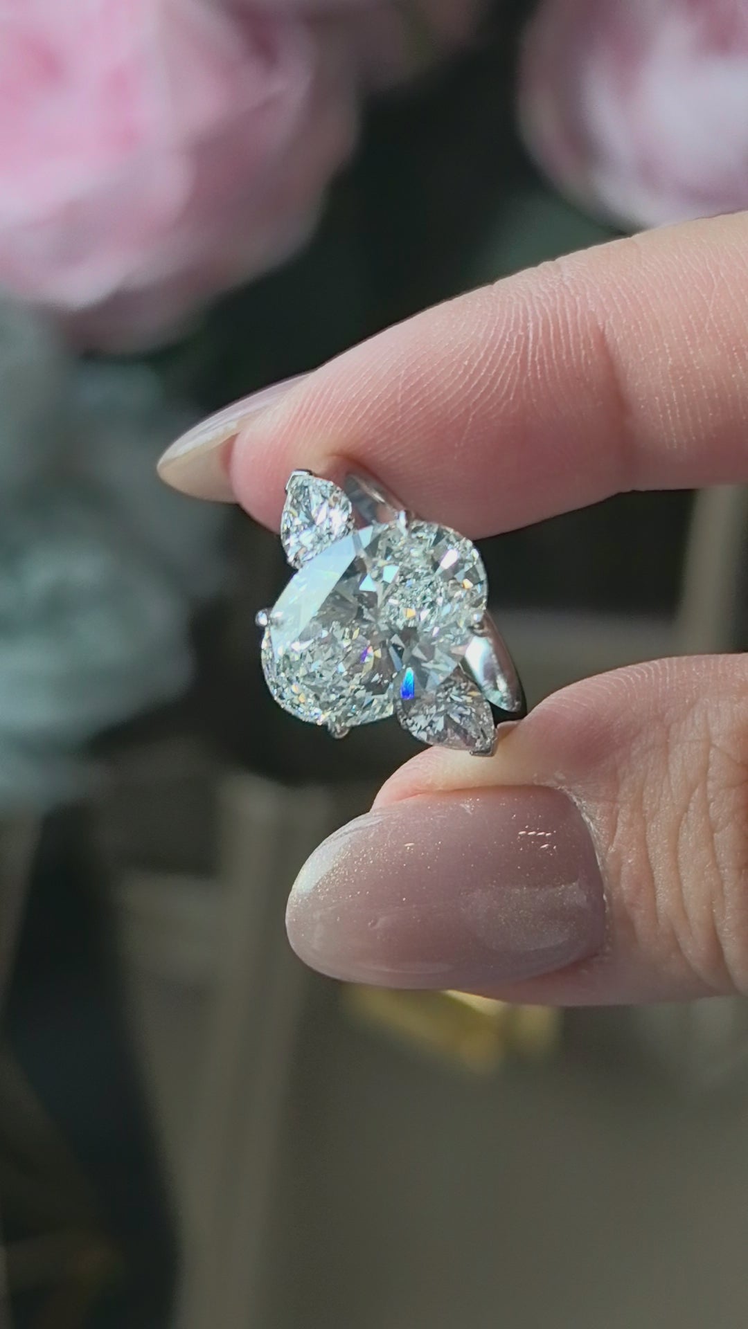 Oval-Center Trilogy Ring with Pear Sidestones